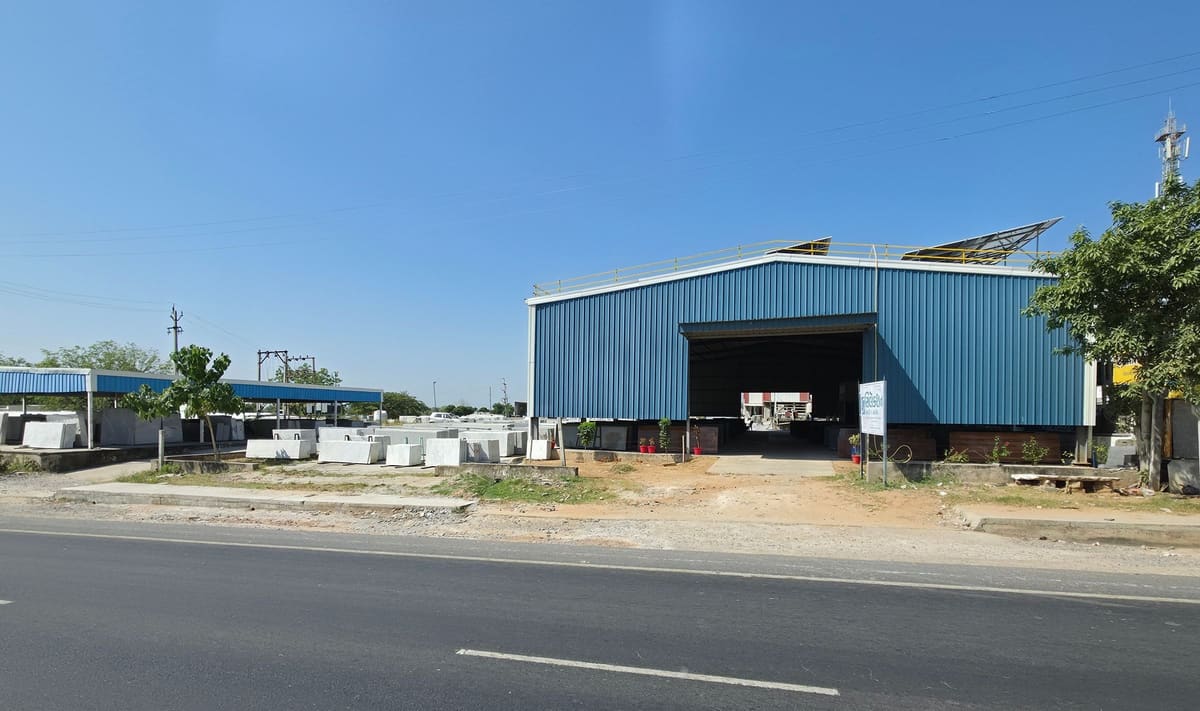 The processing shed, block yard and rooftop solar on Abu Road Highway