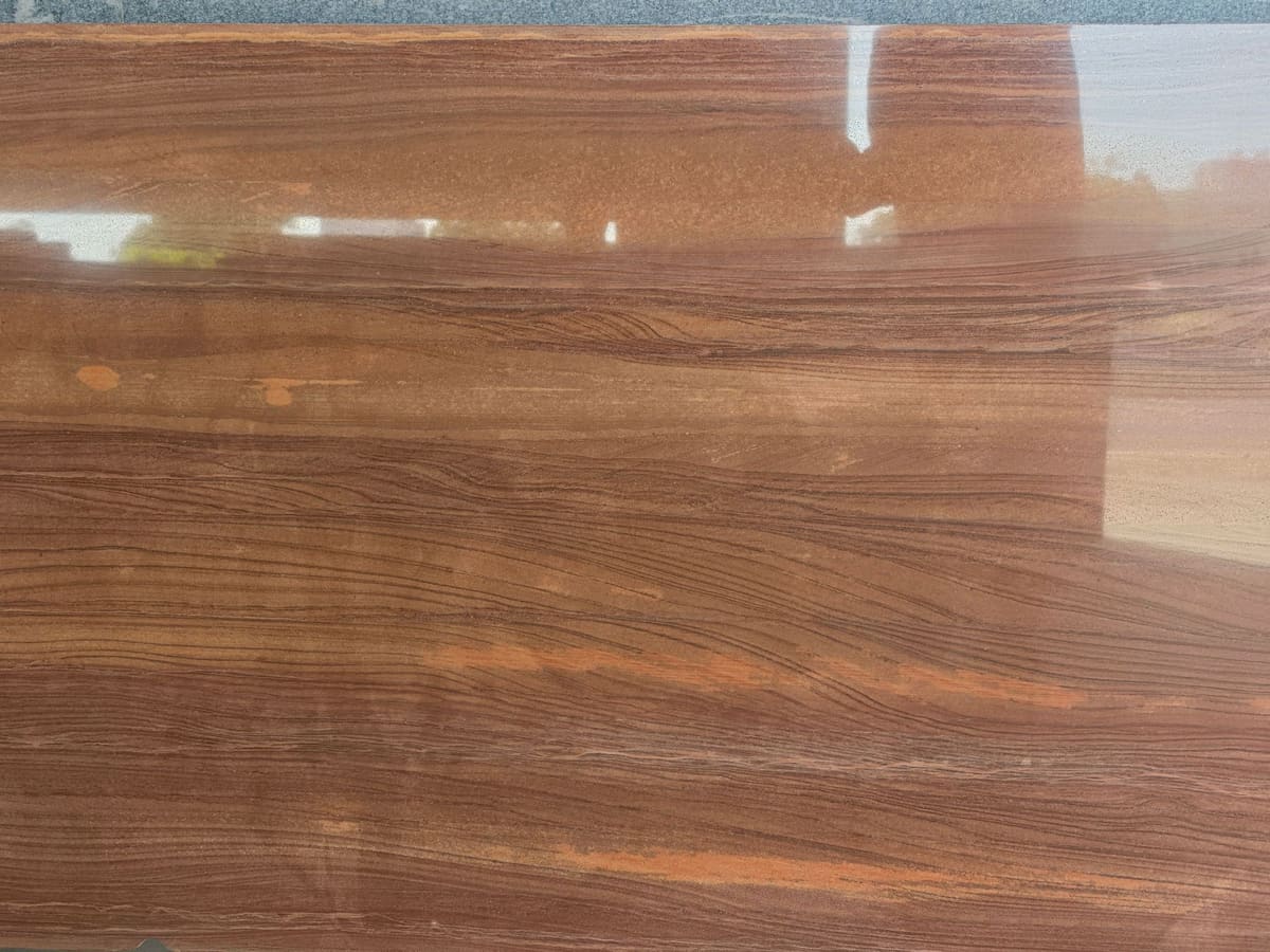 Teak Rainbow granite slab showing wood-grain pattern at Selection Granite & Marble, Palanpur